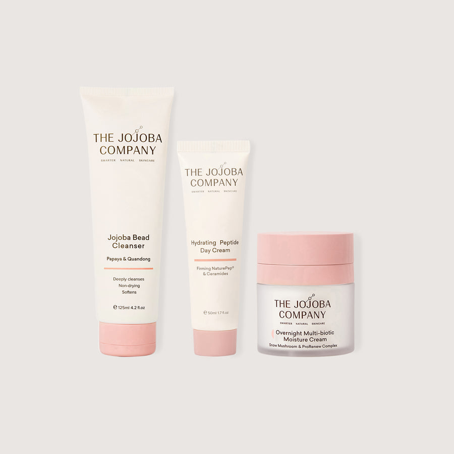 Three skincare products from The Jojoba Company on a white background